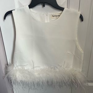 Beautiful never worn fluffy crop top. Perfect for bachelorettes or a night out.